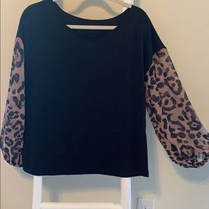 Leopard and black blouse